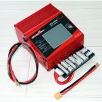 تصویر شارژر باتری 1 تا 8 سل ULTRAPOWER 1350W 40A از نمای روبه رو به رنگ قرمز به همراه سیم کانکتور و سیم بالانسر